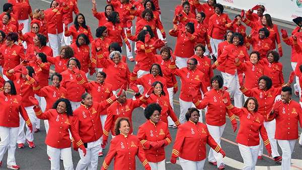 Photo of Delta Sigma Theta members marching in Washington, DC for the 100th anniversary of the Women's Suffrage Parade of 1913